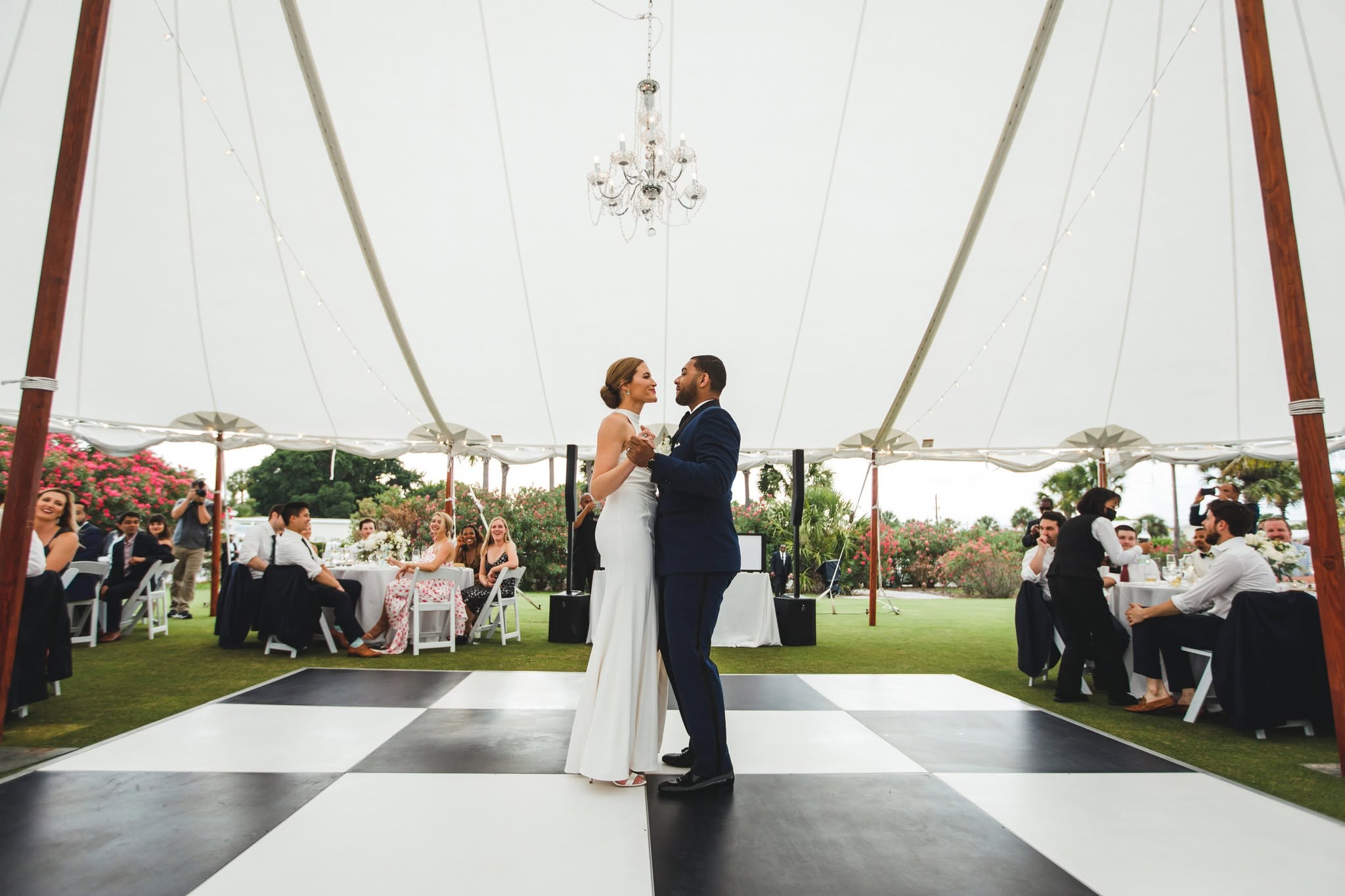 sailcloth wedding reception tent with black and white dance floor